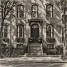 Red-brick townhouse rendered as an expressive charcoal drawing